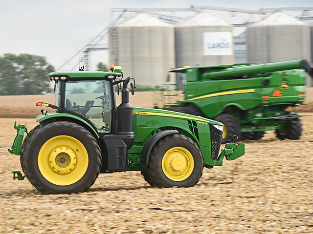 A John Deere 8320R runs autonomously along with other unmanned big hardware at the 2018 Farm Progress Show, Image by Joel Reichenberger